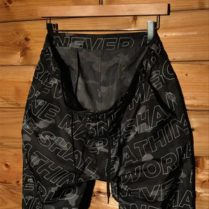 Bape, A Bathing Ape Text Colour Black Camo trousers
