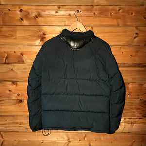Undercover x Uniqlo Leather Panelled puffer jacket