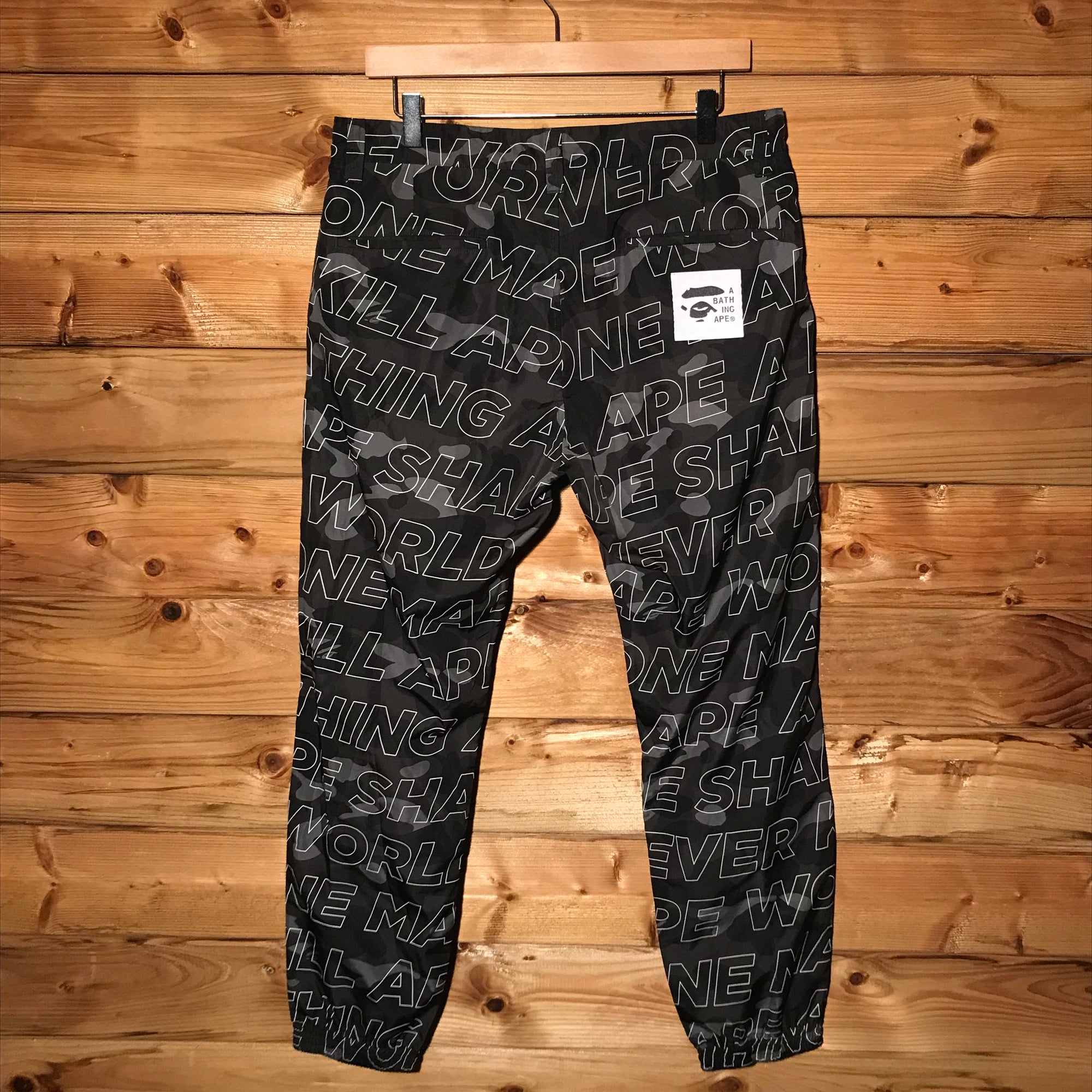Bape, A Bathing Ape Text Colour Black Camo trousers