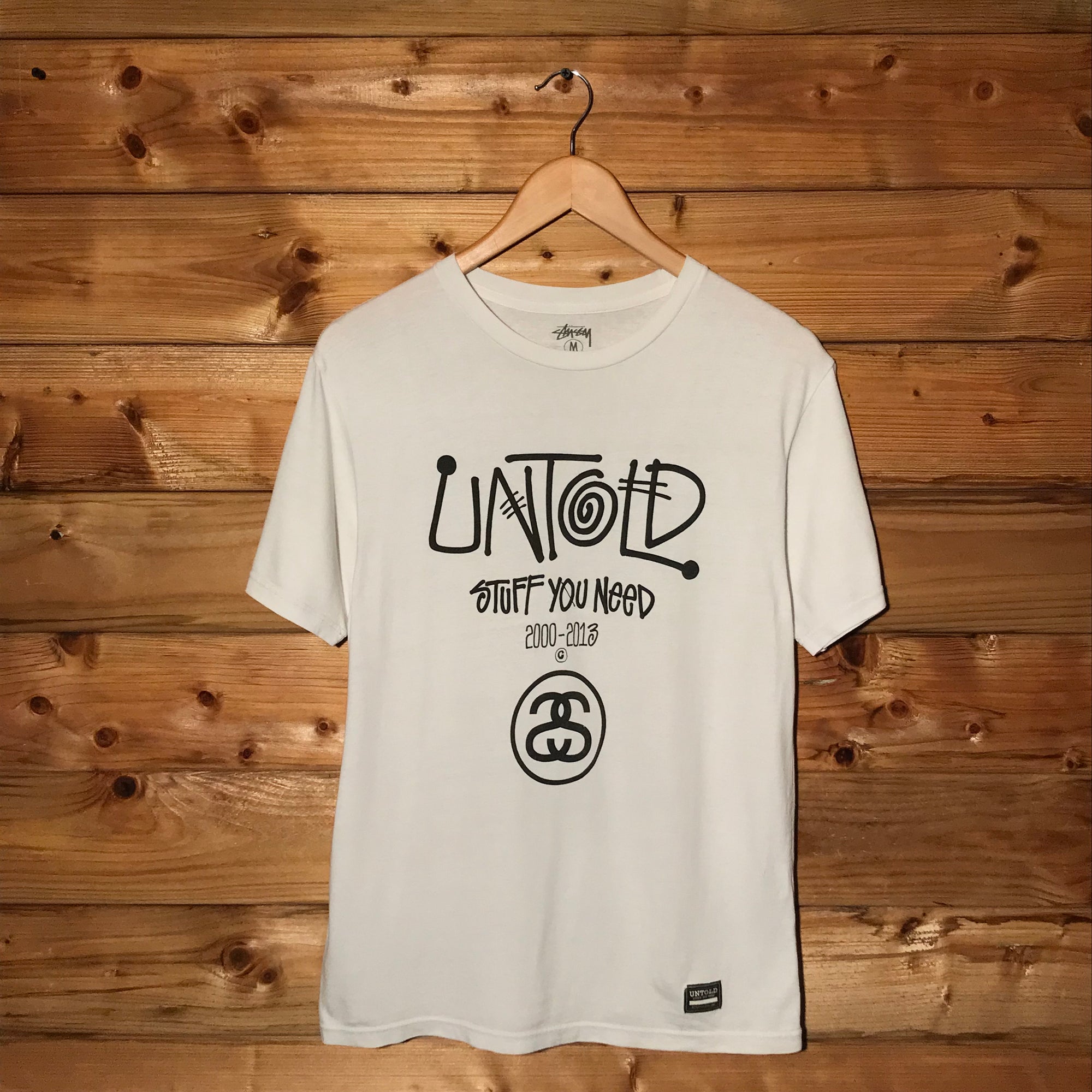 2013 Stüssy x UNTOLD Stuff You Need Centre Spellout t shirt