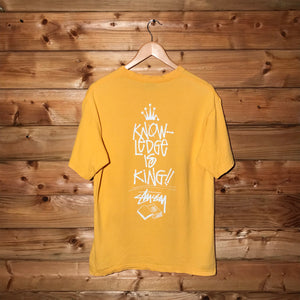 Stüssy Knowledge Is King Book Pile Script Spellout t shirt