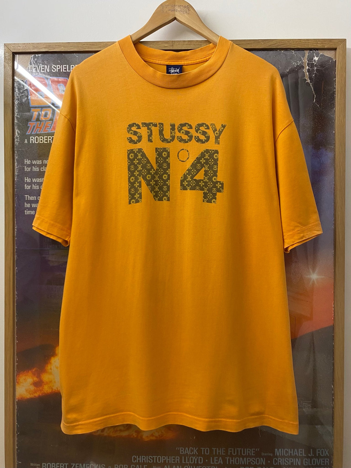 Stussy orange t-shirt, photo 1 of 7